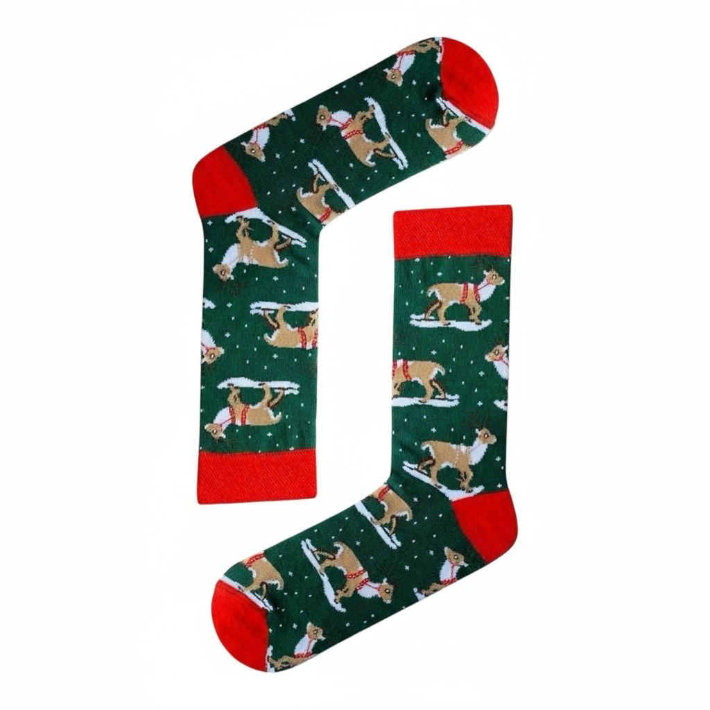 Green socks with red cuffs and toes featuring a pattern of dogs on skis.